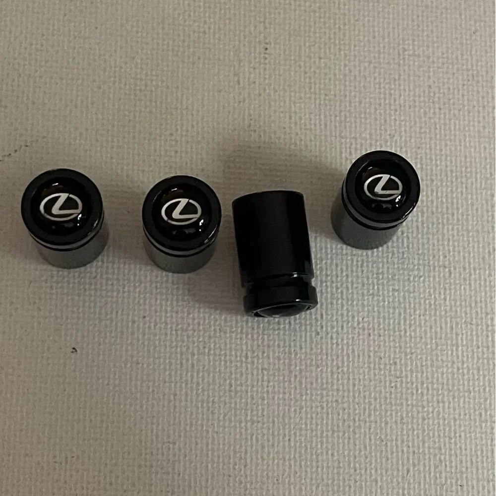 Lexus valve Stem caps in Black with logo set of 4 NWT
